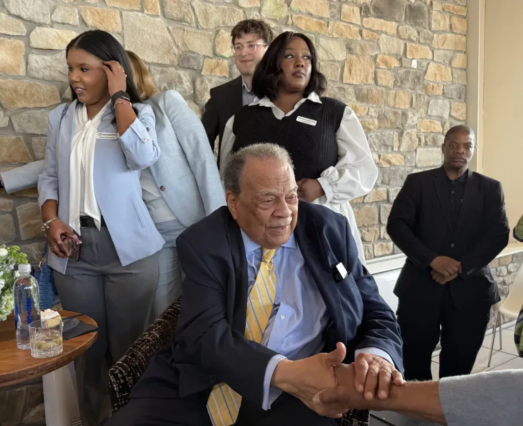 Andrew Young greeting guests at his 94th birthday celebration