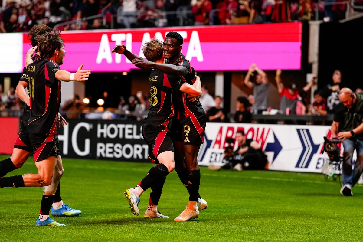 Atlanta United players celebrate a goal at Mercedes-Benz Stadium