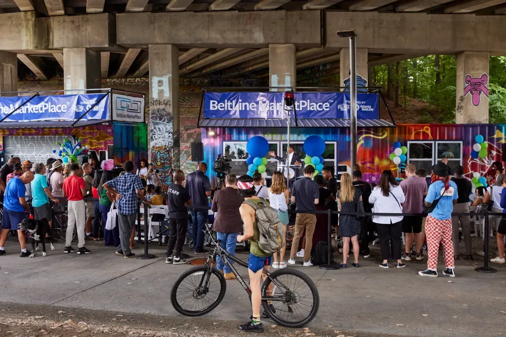 Ribbon cutting at an Atlanta Beltline Marketplace shipping container shop
