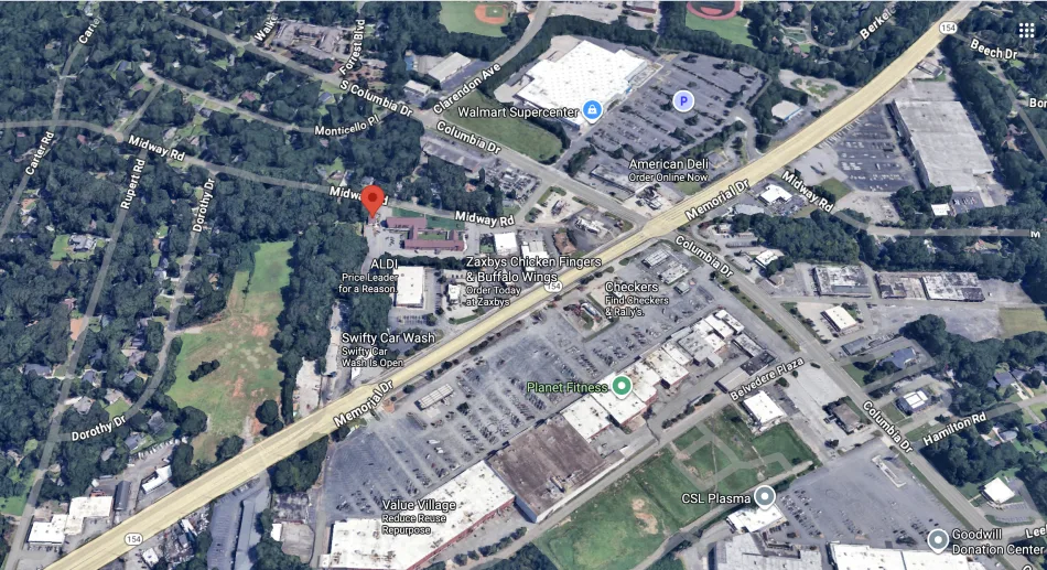 Site plan showing 18 houses arranged around courtyards at Cottages at Midway