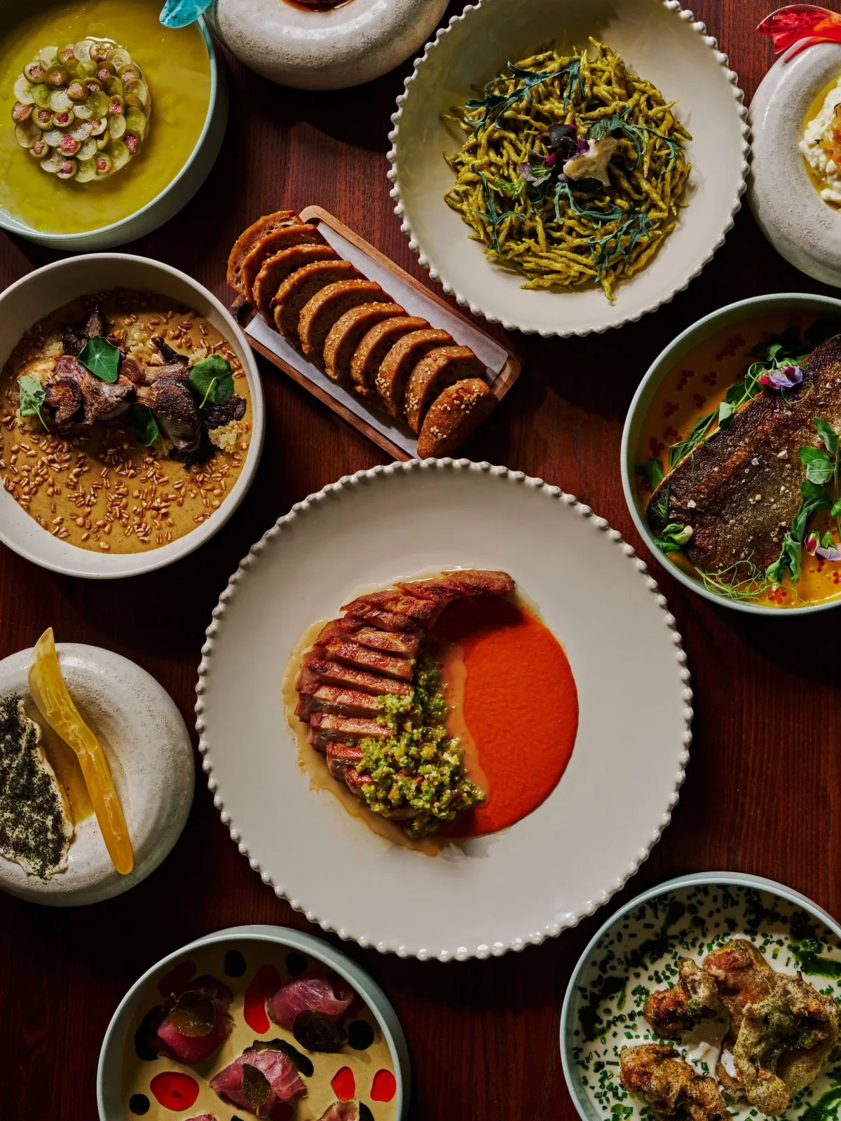 Interior of Füm restaurant showing open kitchen with pasta making station