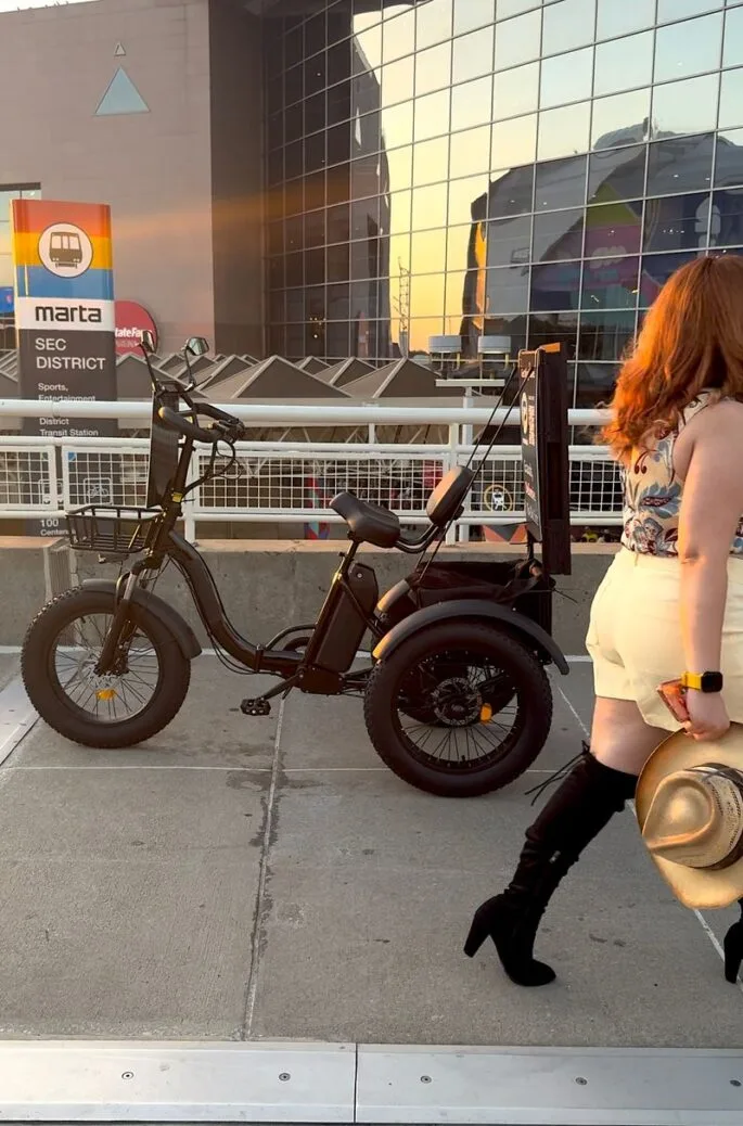 A Purposers OOH e-trike carrying a digital advertising screen on an Atlanta street